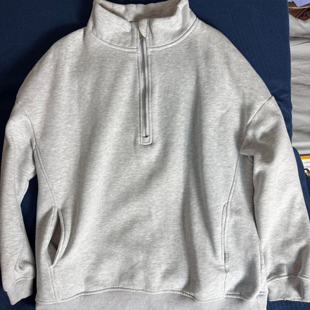 gray quarter-zip sweater